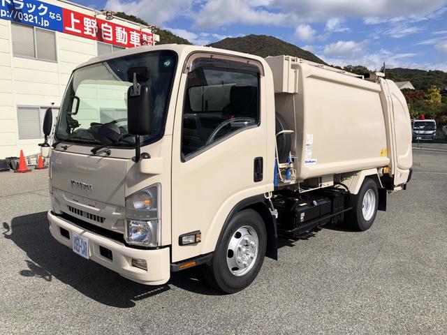 エルフトラック 　プレス式パッカー車　６．０ｍ３　新明和工業製　２９５０ｋｇ積載　連続積込　汚水タンク付　逆流防止装置　ワイド幅　１１尺ミドル　６速ＭＴ（3枚目）