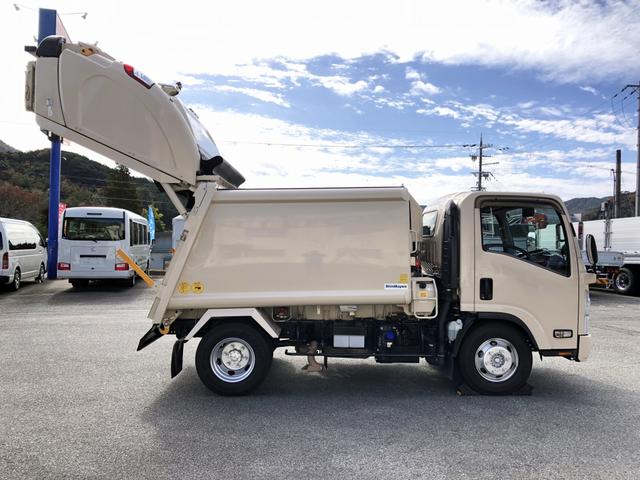 エルフトラック 　プレス式パッカー車　６．０ｍ３　新明和工業製　２９５０ｋｇ積載　連続積込　汚水タンク付　逆流防止装置　ワイド幅　１１尺ミドル　６速ＭＴ（5枚目）