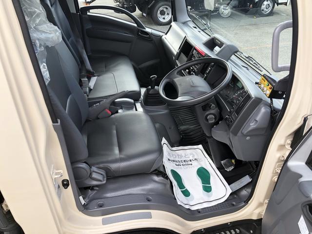 エルフトラック 　プレス式パッカー車　６．０ｍ３　新明和工業製　２９５０ｋｇ積載　連続積込　汚水タンク付　逆流防止装置　ワイド幅　１１尺ミドル　６速ＭＴ（8枚目）