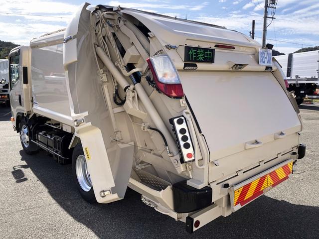 エルフトラック 　プレス式パッカー車　６．０ｍ３　新明和工業製　２９５０ｋｇ積載　連続積込　汚水タンク付　逆流防止装置　ワイド幅　１１尺ミドル　６速ＭＴ（28枚目）