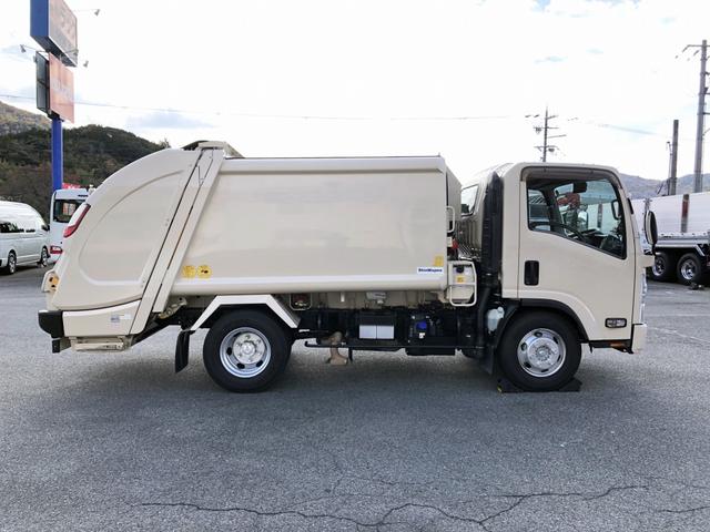 エルフトラック 　プレス式パッカー車　６．０ｍ３　新明和工業製　２９５０ｋｇ積載　連続積込　汚水タンク付　逆流防止装置　ワイド幅　１１尺ミドル　６速ＭＴ（35枚目）