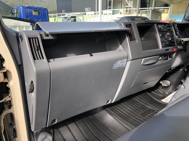 エルフトラック 　プレス式パッカー車　６．０ｍ３　新明和工業製　２９５０ｋｇ積載　連続積込　汚水タンク付　逆流防止装置　ワイド幅　１１尺ミドル　６速ＭＴ（60枚目）