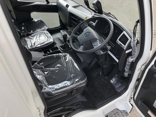 ファイター 　増トン　土砂ダンプ　新明和工業製　７．９トン積載　容積４．０ｍ３　標準幅　ベッド付　３．４ｍボディ　角底　強化一方開　２４０馬力（8枚目）