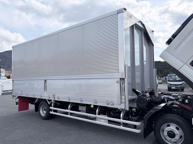 フォワード 　アルミウイング　２．９トン積載　日本フルハーフ製　アルミコルゲート　あおり開閉補助装置　ラッシング２段　ワイド　ベッド付　６．２ｍボディ　２１０馬力（36枚目）