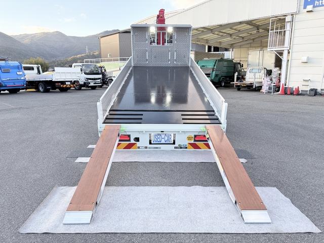 ファイター 　増トン　６段セルフクレーン　重機運搬車　古河ユニック　警報仕様　５．８トン積載　５．５ｍボディ　標準幅　ベッド付　　サニックス製造りボディ　あゆみ板付（10枚目）