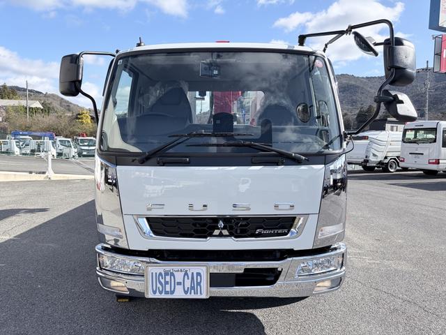 ファイター 　増トン　６段セルフクレーン　重機運搬車　古河ユニック　警報仕様　５．８トン積載　５．５ｍボディ　標準幅　ベッド付　　サニックス製造りボディ　あゆみ板付（48枚目）