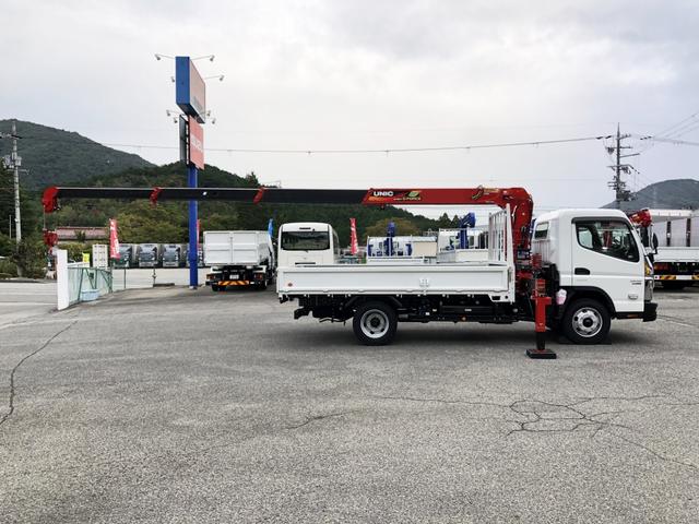 キャンター 　カスタム仕様　４段クレーン付　３．８トン積載　古河ユニック製　警報仕様　超ワイド角足アウトリガ　ワイド　ロング　全低床　木製あおり３方開　１７５馬力（5枚目）