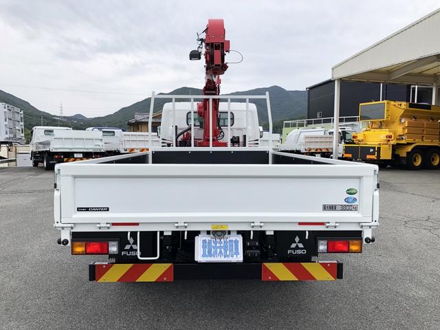 キャンター 　カスタム仕様　４段クレーン付　３．８トン積載　古河ユニック製　警報仕様　超ワイド角足アウトリガ　ワイド　ロング　全低床　木製あおり３方開　１７５馬力（6枚目）
