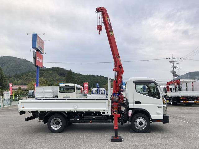 キャンター 　カスタム仕様　４段クレーン付　３．８トン積載　古河ユニック製　警報仕様　超ワイド角足アウトリガ　ワイド　ロング　全低床　木製あおり３方開　１７５馬力（23枚目）