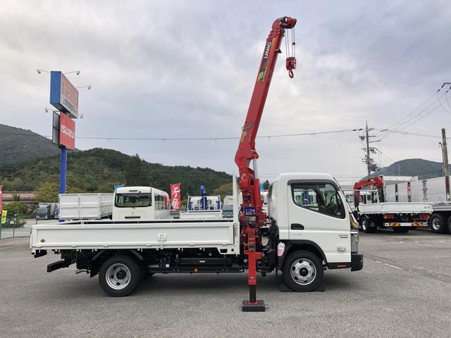 キャンター 　カスタム仕様　４段クレーン付　３．８トン積載　古河ユニック製　警報仕様　超ワイド角足アウトリガ　ワイド　ロング　全低床　木製あおり３方開　１７５馬力（24枚目）