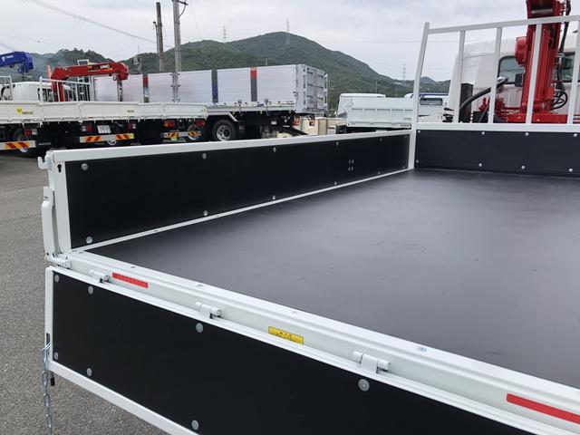 キャンター 　カスタム仕様　４段クレーン付　３．８トン積載　古河ユニック製　警報仕様　超ワイド角足アウトリガ　ワイド　ロング　全低床　木製あおり３方開　１７５馬力（33枚目）