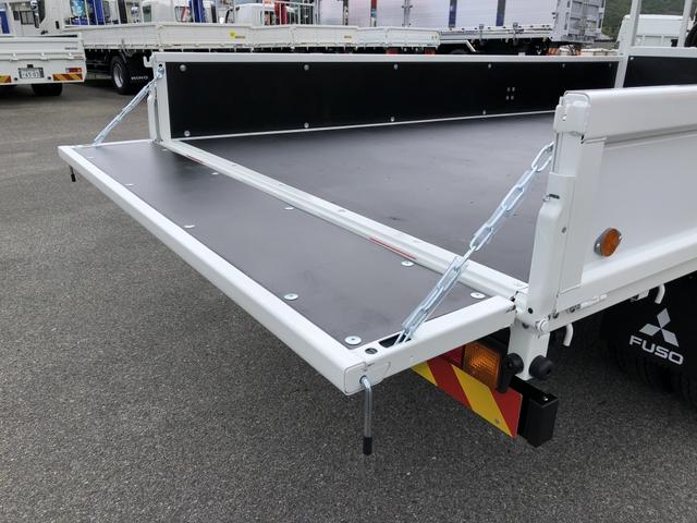 キャンター 　カスタム仕様　４段クレーン付　３．８トン積載　古河ユニック製　警報仕様　超ワイド角足アウトリガ　ワイド　ロング　全低床　木製あおり３方開　１７５馬力（35枚目）