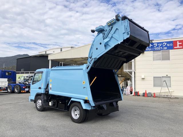 キャンター 　プレス式パッカー　５．９ｍ３　極東開発工業製　プレスパック　連続積込　汚水タンク付　リヤシャッター式扉　３０５０ｋｇ積載　ワイド幅　１１尺ミドル（2枚目）