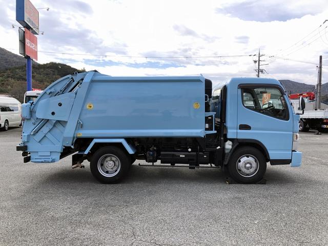 キャンター 　プレス式パッカー　５．９ｍ３　極東開発工業製　プレスパック　連続積込　汚水タンク付　リヤシャッター式扉　３０５０ｋｇ積載　ワイド幅　１１尺ミドル（38枚目）