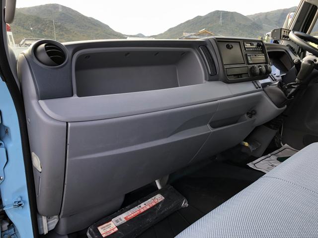 キャンター 　プレス式パッカー　５．９ｍ３　極東開発工業製　プレスパック　連続積込　汚水タンク付　リヤシャッター式扉　３０５０ｋｇ積載　ワイド幅　１１尺ミドル（58枚目）