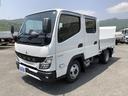 キャンター 　平ボディ　Ｗキャブ　垂直パワーゲート付　ＡＴ車　６人乗り　リヤエアコン付　４ナンバー　標準幅　１０尺　全低床　２トン積載　木製あおり２方開（5枚目）