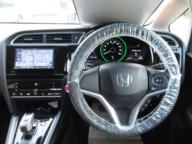 シャトル ハイブリッド ホンダセンシング メモリーナビ ホンダセンシング 追突軽減ブレーキ トノカバー 禁煙車 バックカメラ レーンキープアシスト アダプティブクルーズ ETC BT音楽 スマートキー2個 横滑り防止(3枚目)