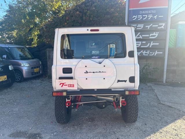 ジムニー ＸＧ　ワンオーナー・ターボ・ガレージ保管車・４ＷＤ・５ＭＴ・禁煙車・リフトアップ・外品マフラー・外品ホイル・ナビ・ＴＶ・Ｂｌｕｅｔｏｏｔｈオーディオ機能・シートカバー（5枚目）