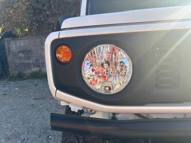 ジムニー ＸＧ　ワンオーナー・ターボ・ガレージ保管車・４ＷＤ・５ＭＴ・禁煙車・リフトアップ・外品マフラー・外品ホイル・ナビ・ＴＶ・Ｂｌｕｅｔｏｏｔｈオーディオ機能・シートカバー（16枚目）