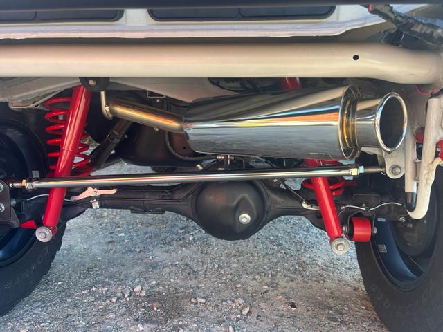 ジムニー ＸＧ　ワンオーナー・ターボ・ガレージ保管車・４ＷＤ・５ＭＴ・禁煙車・リフトアップ・外品マフラー・外品ホイル・ナビ・ＴＶ・Ｂｌｕｅｔｏｏｔｈオーディオ機能・シートカバー（24枚目）