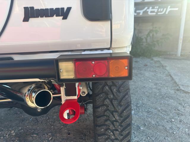 ジムニー ＸＧ　ワンオーナー・ターボ・ガレージ保管車・４ＷＤ・５ＭＴ・禁煙車・リフトアップ・外品マフラー・外品ホイル・ナビ・ＴＶ・Ｂｌｕｅｔｏｏｔｈオーディオ機能・シートカバー（27枚目）