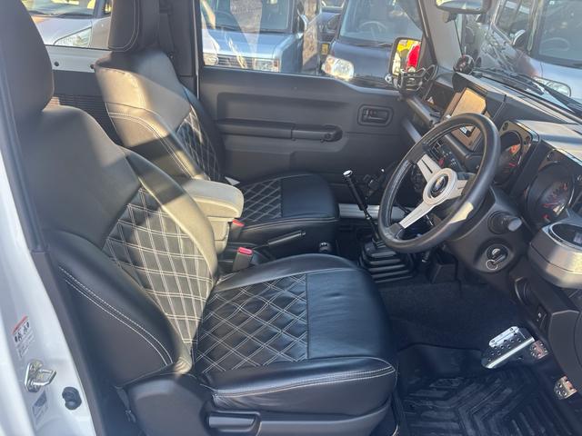 ジムニー ＸＧ　ワンオーナー・ターボ・ガレージ保管車・４ＷＤ・５ＭＴ・禁煙車・リフトアップ・外品マフラー・外品ホイル・ナビ・ＴＶ・Ｂｌｕｅｔｏｏｔｈオーディオ機能・シートカバー（29枚目）