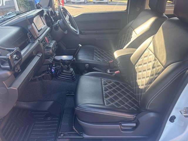 ジムニー ＸＧ　ワンオーナー・ターボ・ガレージ保管車・４ＷＤ・５ＭＴ・禁煙車・リフトアップ・外品マフラー・外品ホイル・ナビ・ＴＶ・Ｂｌｕｅｔｏｏｔｈオーディオ機能・シートカバー（30枚目）