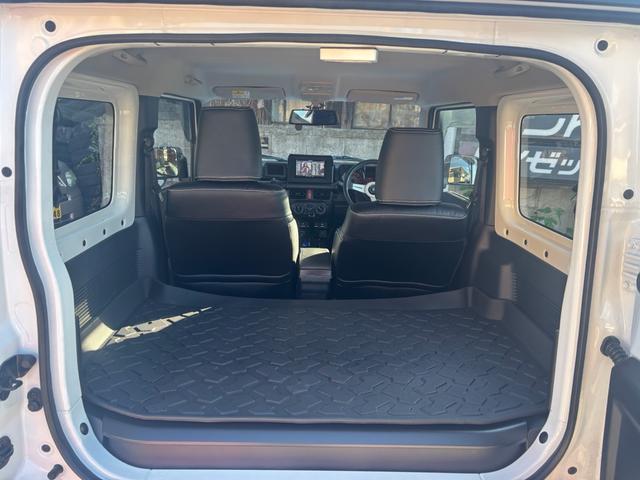 ジムニー ＸＧ　ワンオーナー・ターボ・ガレージ保管車・４ＷＤ・５ＭＴ・禁煙車・リフトアップ・外品マフラー・外品ホイル・ナビ・ＴＶ・Ｂｌｕｅｔｏｏｔｈオーディオ機能・シートカバー（31枚目）