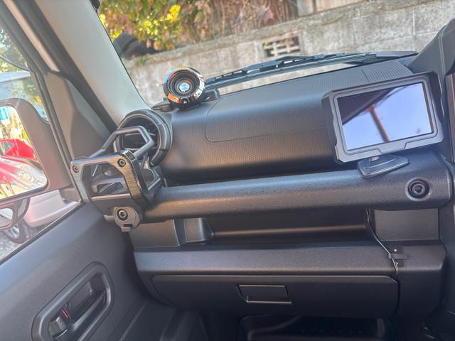 ジムニー ＸＧ　ワンオーナー・ターボ・ガレージ保管車・４ＷＤ・５ＭＴ・禁煙車・リフトアップ・外品マフラー・外品ホイル・ナビ・ＴＶ・Ｂｌｕｅｔｏｏｔｈオーディオ機能・シートカバー（44枚目）