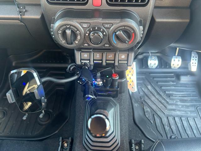 ジムニー ＸＧ　ワンオーナー・ターボ・ガレージ保管車・４ＷＤ・５ＭＴ・禁煙車・リフトアップ・外品マフラー・外品ホイル・ナビ・ＴＶ・Ｂｌｕｅｔｏｏｔｈオーディオ機能・シートカバー（45枚目）