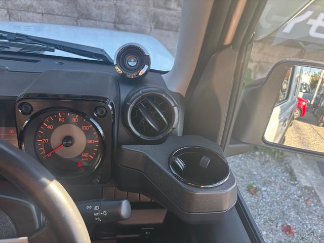 ジムニー ＸＧ　ワンオーナー・ターボ・ガレージ保管車・４ＷＤ・５ＭＴ・禁煙車・リフトアップ・外品マフラー・外品ホイル・ナビ・ＴＶ・Ｂｌｕｅｔｏｏｔｈオーディオ機能・シートカバー（52枚目）