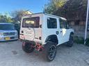 ジムニー ＸＧ　ワンオーナー・ターボ・ガレージ保管車・４ＷＤ・５ＭＴ・禁煙車・リフトアップ・外品マフラー・外品ホイル・ナビ・ＴＶ・Ｂｌｕｅｔｏｏｔｈオーディオ機能・シートカバー（4枚目）