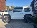 ジムニー ＸＧ　ワンオーナー・ターボ・ガレージ保管車・４ＷＤ・５ＭＴ・禁煙車・リフトアップ・外品マフラー・外品ホイル・ナビ・ＴＶ・Ｂｌｕｅｔｏｏｔｈオーディオ機能・シートカバー（8枚目）