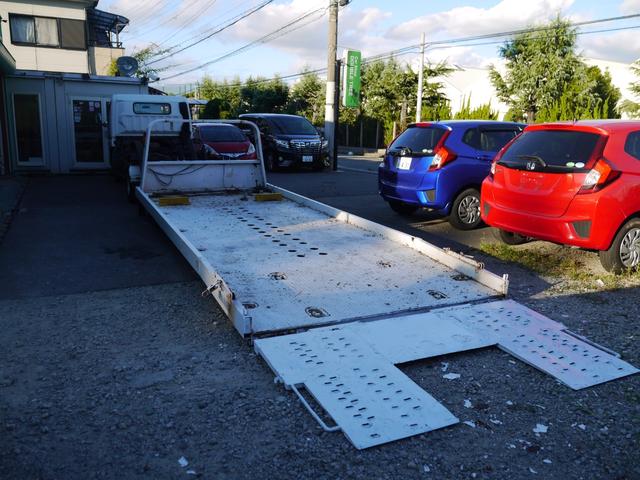 キャンター 超ロングＤＸターボ　積載車　荷台極東フルフラット　荷台リモコン有　積載２９５０ｋｇ　６速　ディーゼルターボ　記録簿／１２ヵ月記録１５枚以上有り（7枚目）