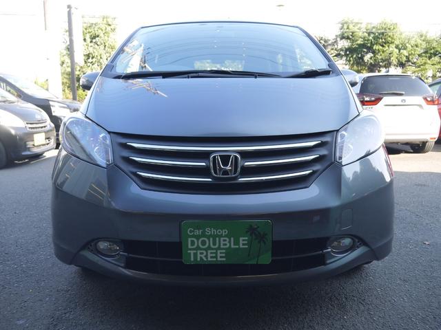 フリード フレックス ジャストセレクション 1年保証付き 電動スライドドア 純正エアロ 地デジTV ナビ 携帯リンク バックカメラ HIDオートライト 安全ボディ 禁煙車 キーレス ABS 電格ミラー ウォークスルー Wエアーバック(2枚目)