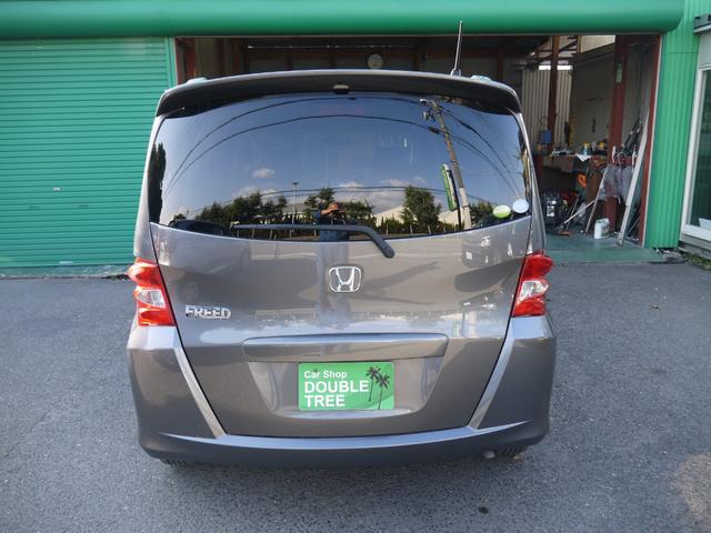 フリード フレックス ジャストセレクション 1年保証付き 電動スライドドア 純正エアロ 地デジTV ナビ 携帯リンク バックカメラ HIDオートライト 安全ボディ 禁煙車 キーレス ABS 電格ミラー ウォークスルー Wエアーバック(6枚目)