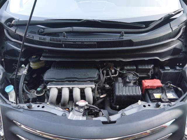 フリード フレックス ジャストセレクション 1年保証付き 電動スライドドア 純正エアロ 地デジTV ナビ 携帯リンク バックカメラ HIDオートライト 安全ボディ 禁煙車 キーレス ABS 電格ミラー ウォークスルー Wエアーバック(10枚目)