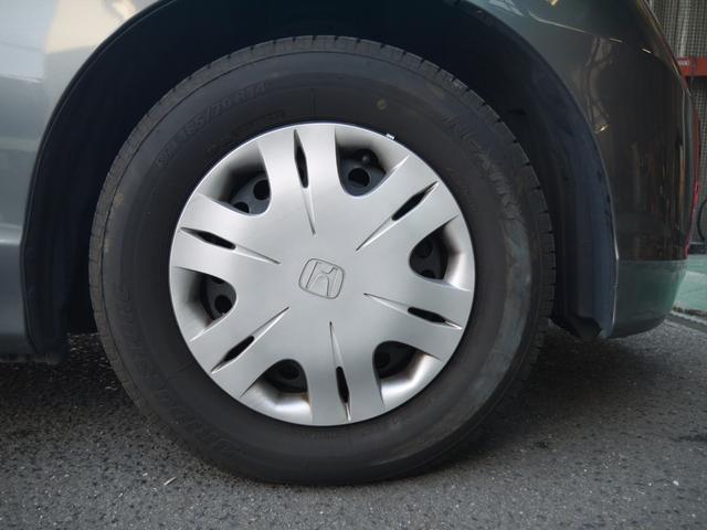 フリード フレックス ジャストセレクション 1年保証付き 電動スライドドア 純正エアロ 地デジTV ナビ 携帯リンク バックカメラ HIDオートライト 安全ボディ 禁煙車 キーレス ABS 電格ミラー ウォークスルー Wエアーバック(11枚目)