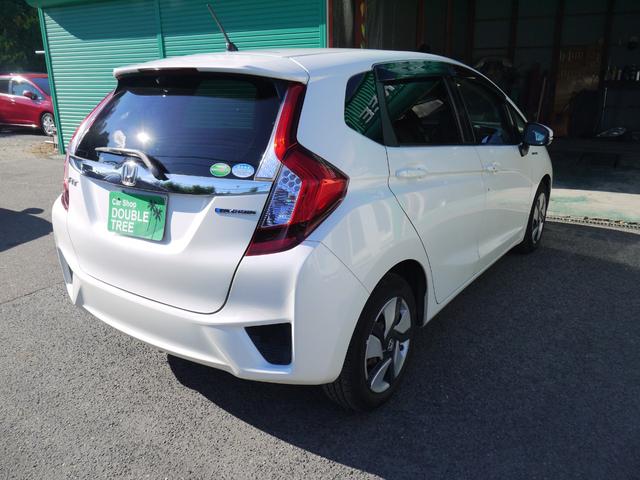 フィットハイブリッド Fパッケージ 2年保証付き 衝突軽減ブレーキ スマートキー プッシュスタート 地デジTV ナビ Bluetooth対応 バックカメラ HIDオートライト 安全ボディ 禁煙車 ABS 電格ミラー Wエアーバック(5枚目)