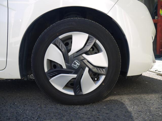 フィットハイブリッド Fパッケージ 2年保証付き 衝突軽減ブレーキ スマートキー プッシュスタート 地デジTV ナビ Bluetooth対応 バックカメラ HIDオートライト 安全ボディ 禁煙車 ABS 電格ミラー Wエアーバック(10枚目)