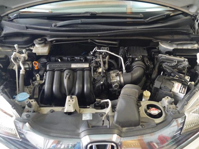 フィットハイブリッド Fパッケージ 2年保証付き 衝突軽減ブレーキ スマートキー プッシュスタート 地デジTV ナビ Bluetooth対応 バックカメラ HIDオートライト 安全ボディ 禁煙車 ABS 電格ミラー Wエアーバック(12枚目)