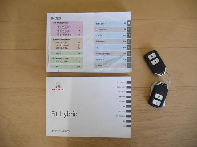 フィットハイブリッド Fパッケージ 2年保証付き 衝突軽減ブレーキ スマートキー プッシュスタート 地デジTV ナビ Bluetooth対応 バックカメラ HIDオートライト 安全ボディ 禁煙車 ABS 電格ミラー Wエアーバック(21枚目)