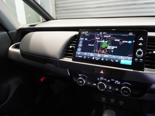 フィット ｅ：ＨＥＶホーム　当社試乗車　禁煙車　純正メモリーナビ　ホンダセンシング　ＬＥＤヘッドライト　ＥＴＣ　ドライブレコーダー　Ｕ－ＳｅｌｅｃｔＰｌｅｍｉｕｍ２年間走行無制限保証（34枚目）
