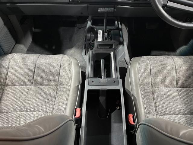 ジープ・チェロキー スポーツ　前期スポーツ・４ＷＤ・同色オールペン済・ウッドシート施工済・新品前後メッキバンパー・新品メッキグリル・新品メッキドアハンドル・ＢＦグッドリッチオールテレーンタイヤ・デイトナホイール新品・ネイビー（24枚目）
