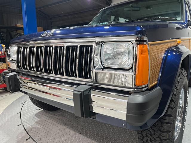 ジープ・チェロキー スポーツ　前期スポーツ・４ＷＤ・同色オールペン済・ウッドシート施工済・新品前後メッキバンパー・新品メッキグリル・新品メッキドアハンドル・ＢＦグッドリッチオールテレーンタイヤ・デイトナホイール新品・ネイビー（43枚目）