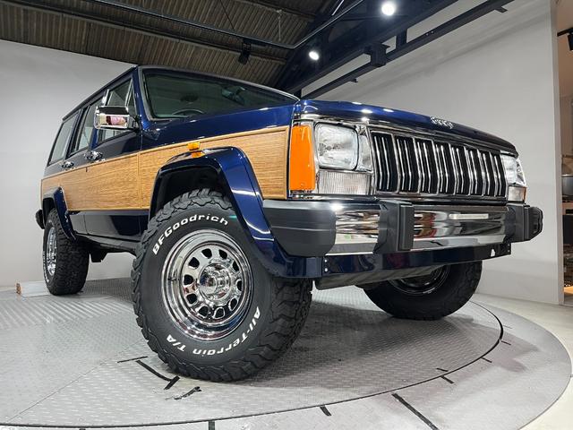 ジープ・チェロキー スポーツ　前期スポーツ・４ＷＤ・同色オールペン済・ウッドシート施工済・新品前後メッキバンパー・新品メッキグリル・新品メッキドアハンドル・ＢＦグッドリッチオールテレーンタイヤ・デイトナホイール新品・ネイビー（48枚目）