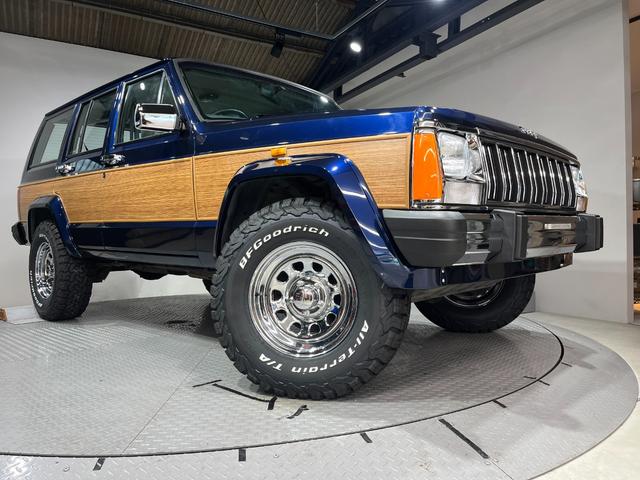 ジープ・チェロキー スポーツ　前期スポーツ・４ＷＤ・同色オールペン済・ウッドシート施工済・新品前後メッキバンパー・新品メッキグリル・新品メッキドアハンドル・ＢＦグッドリッチオールテレーンタイヤ・デイトナホイール新品・ネイビー（50枚目）