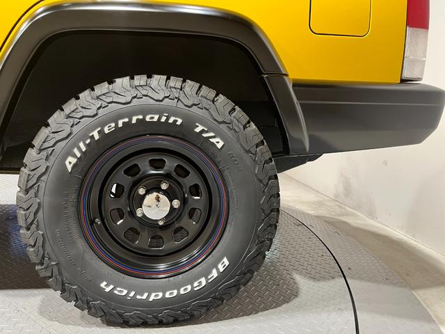 ジープ・チェロキー スポーツ　後期スポーツ・４ＷＤ・新品ＢＦグッドリッチオールテレーンタイヤ・デイトナブラックホイール・ルーフレール・自社オールペン済み・イエロー（38枚目）