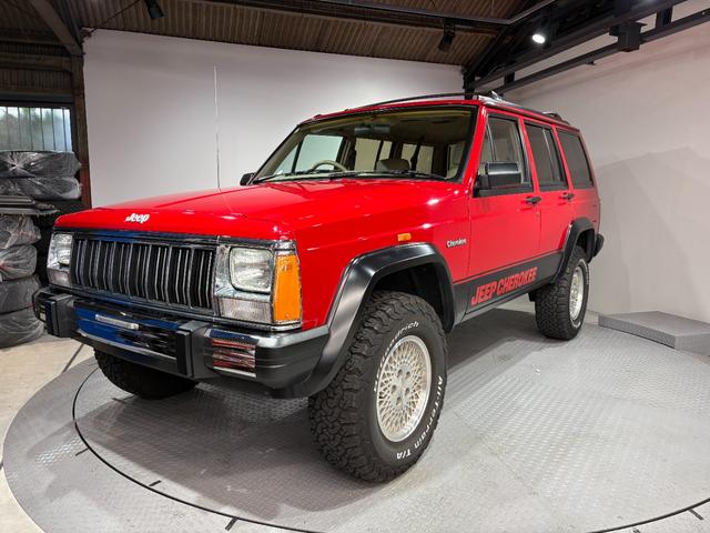 ジープ・チェロキー リミテッド　前期リミテッド・４ＷＤ・Ｒ５年オールペン、ＨＱ整備済み・Ｂｌｕｅｔｏｏｔｈオーディオ・３本スポークハンドル・シートスポーツ仕様・レッド（7枚目）
