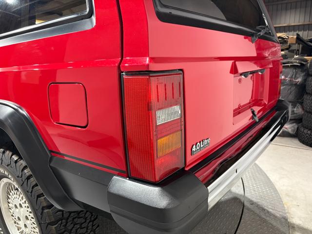 ジープ・チェロキー リミテッド　前期リミテッド・４ＷＤ・Ｒ５年オールペン、ＨＱ整備済み・Ｂｌｕｅｔｏｏｔｈオーディオ・３本スポークハンドル・シートスポーツ仕様・レッド（45枚目）